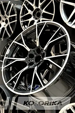 Покраска кованых дисков BMW M5 в чёрный глянец